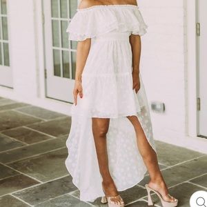 These three boutique high low floral dress🌸